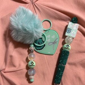 Teal Keychain with matching rhinestone pen.